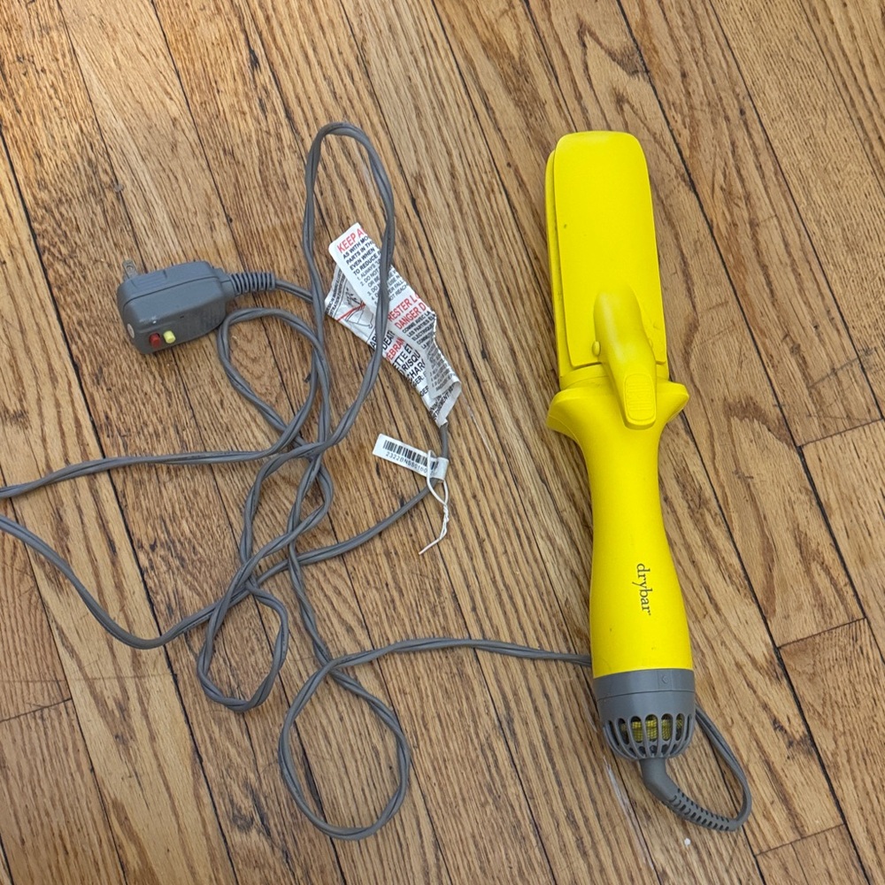 Yellow DRYBAR Hair Straightener brush